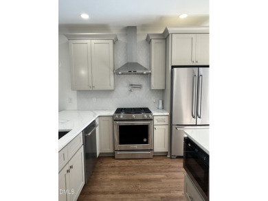 This beautifully appointed modern home at 2538 W Wilson St on Hillandale Golf Course in North Carolina - for sale on GolfHomes.com, golf home, golf lot