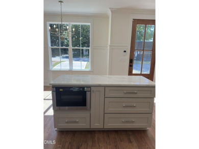 This beautifully appointed modern home at 2538 W Wilson St on Hillandale Golf Course in North Carolina - for sale on GolfHomes.com, golf home, golf lot