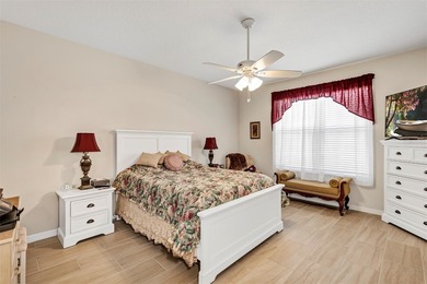 Welcome to a life that feels like vacation every day. Nestled in on Arlington Ridge Golf Club in Florida - for sale on GolfHomes.com, golf home, golf lot