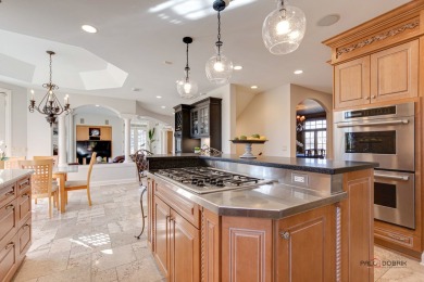 Discover luxury living in this stunning 4-bedroom, 4.2-bath home on Conway Farms Golf Club in Illinois - for sale on GolfHomes.com, golf home, golf lot