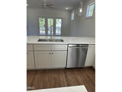 This beautifully appointed modern home at 2538 W Wilson St on Hillandale Golf Course in North Carolina - for sale on GolfHomes.com, golf home, golf lot