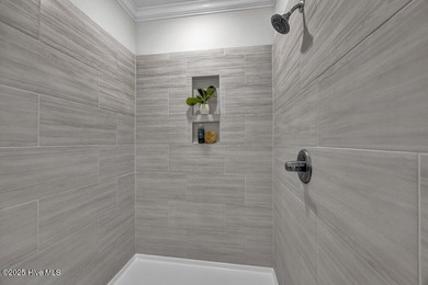 Discover the charm of low-maintenance living in this beautifully on Cape Fear National At Brunswick Forest in North Carolina - for sale on GolfHomes.com, golf home, golf lot