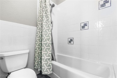 Welcome to this one-of-a-kind, spacious 4-bedroom, 2-large-den on Royal Tee Country Club in Florida - for sale on GolfHomes.com, golf home, golf lot