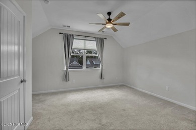 Discover the charm of low-maintenance living in this beautifully on Cape Fear National At Brunswick Forest in North Carolina - for sale on GolfHomes.com, golf home, golf lot