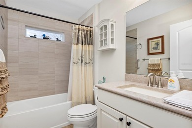 Welcome to a life that feels like vacation every day. Nestled in on Arlington Ridge Golf Club in Florida - for sale on GolfHomes.com, golf home, golf lot