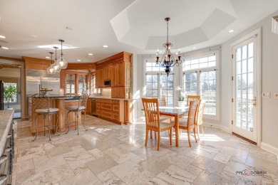 Discover luxury living in this stunning 4-bedroom, 4.2-bath home on Conway Farms Golf Club in Illinois - for sale on GolfHomes.com, golf home, golf lot