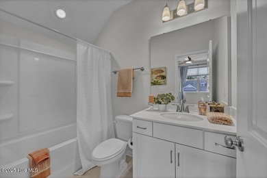 Discover the charm of low-maintenance living in this beautifully on Cape Fear National At Brunswick Forest in North Carolina - for sale on GolfHomes.com, golf home, golf lot