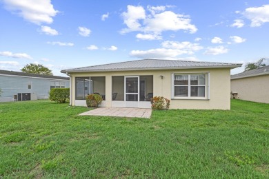 Rare opportunity to own a concrete block, single-family home in on Spanish Lakes Fairways in Florida - for sale on GolfHomes.com, golf home, golf lot