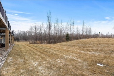 Nestled in Chaska, this premium homesite boasts serene trees and on Chaska Town Course in Minnesota - for sale on GolfHomes.com, golf home, golf lot