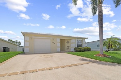 Rare opportunity to own a concrete block, single-family home in on Spanish Lakes Fairways in Florida - for sale on GolfHomes.com, golf home, golf lot