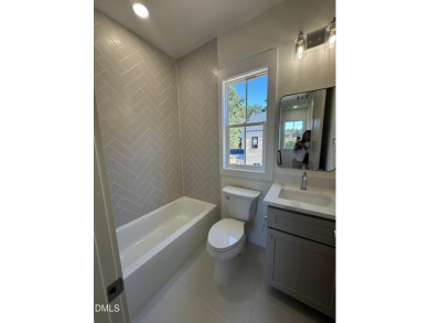 This beautifully appointed modern home at 2538 W Wilson St on Hillandale Golf Course in North Carolina - for sale on GolfHomes.com, golf home, golf lot