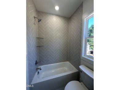 This beautifully appointed modern home at 2538 W Wilson St on Hillandale Golf Course in North Carolina - for sale on GolfHomes.com, golf home, golf lot
