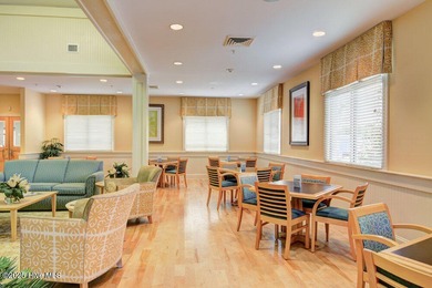 Discover the charm of low-maintenance living in this beautifully on Cape Fear National At Brunswick Forest in North Carolina - for sale on GolfHomes.com, golf home, golf lot