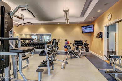 Discover the charm of low-maintenance living in this beautifully on Cape Fear National At Brunswick Forest in North Carolina - for sale on GolfHomes.com, golf home, golf lot