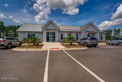 Discover the charm of low-maintenance living in this beautifully on Cape Fear National At Brunswick Forest in North Carolina - for sale on GolfHomes.com, golf home, golf lot