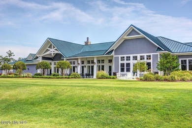 Discover the charm of low-maintenance living in this beautifully on Cape Fear National At Brunswick Forest in North Carolina - for sale on GolfHomes.com, golf home, golf lot