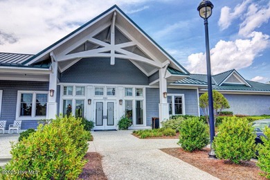 Discover the charm of low-maintenance living in this beautifully on Cape Fear National At Brunswick Forest in North Carolina - for sale on GolfHomes.com, golf home, golf lot