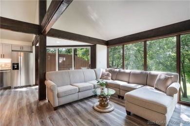 Tucked among mature trees, this unique beautifully updated on Seasons Ridge At Four Seasons in Missouri - for sale on GolfHomes.com, golf home, golf lot