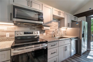 Tucked among mature trees, this unique beautifully updated on Seasons Ridge At Four Seasons in Missouri - for sale on GolfHomes.com, golf home, golf lot