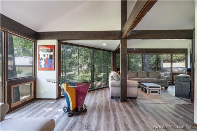 Tucked among mature trees, this unique beautifully updated on Seasons Ridge At Four Seasons in Missouri - for sale on GolfHomes.com, golf home, golf lot