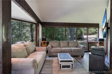 Tucked among mature trees, this unique beautifully updated on Seasons Ridge At Four Seasons in Missouri - for sale on GolfHomes.com, golf home, golf lot