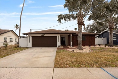 Welcome to the highly desirable Shore Acres neighborhood, where on Mangrove Bay Golf Course in Florida - for sale on GolfHomes.com, golf home, golf lot