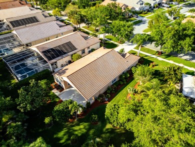 Opportunity Awaits! Beautifully landscaped 3 bedroom, 2 bath on Champions Club at Summerfield in Florida - for sale on GolfHomes.com, golf home, golf lot