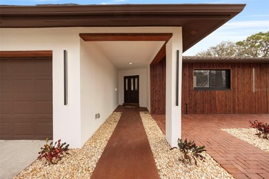 Welcome to the highly desirable Shore Acres neighborhood, where on Mangrove Bay Golf Course in Florida - for sale on GolfHomes.com, golf home, golf lot