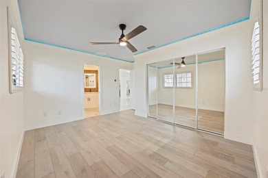 Welcome to the highly desirable Shore Acres neighborhood, where on Mangrove Bay Golf Course in Florida - for sale on GolfHomes.com, golf home, golf lot