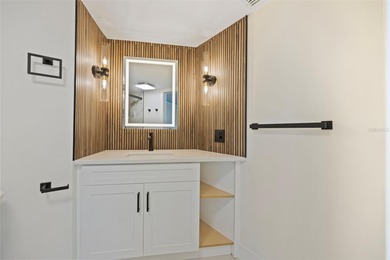 Welcome to the highly desirable Shore Acres neighborhood, where on Mangrove Bay Golf Course in Florida - for sale on GolfHomes.com, golf home, golf lot