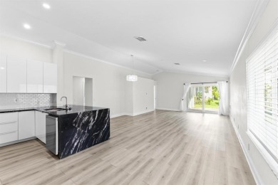 Welcome to this beautifully updated 3BR/2BA one-story home in on Weston Hills Country Club in Florida - for sale on GolfHomes.com, golf home, golf lot