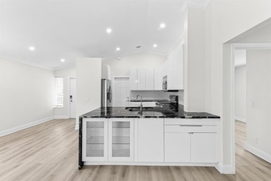 Welcome to this beautifully updated 3BR/2BA one-story home in on Weston Hills Country Club in Florida - for sale on GolfHomes.com, golf home, golf lot