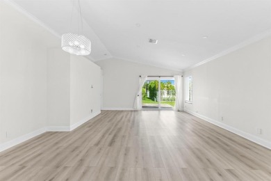 Welcome to this beautifully updated 3BR/2BA one-story home in on Weston Hills Country Club in Florida - for sale on GolfHomes.com, golf home, golf lot