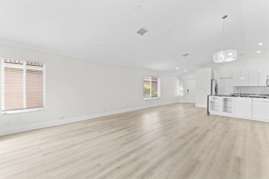 Welcome to this beautifully updated 3BR/2BA one-story home in on Weston Hills Country Club in Florida - for sale on GolfHomes.com, golf home, golf lot