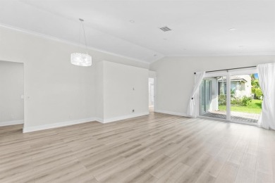 Welcome to this beautifully updated 3BR/2BA one-story home in on Weston Hills Country Club in Florida - for sale on GolfHomes.com, golf home, golf lot