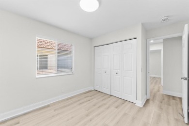 Welcome to this beautifully updated 3BR/2BA one-story home in on Weston Hills Country Club in Florida - for sale on GolfHomes.com, golf home, golf lot