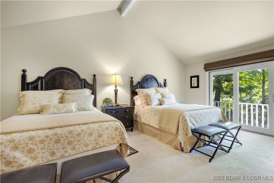 This charming 2,397 sq ft lakefront home in Tan-Tar-A Estates on The Oaks Golf Course in Missouri - for sale on GolfHomes.com, golf home, golf lot
