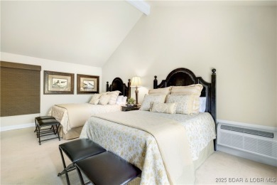 This charming 2,397 sq ft lakefront home in Tan-Tar-A Estates on The Oaks Golf Course in Missouri - for sale on GolfHomes.com, golf home, golf lot
