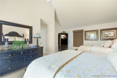 This charming 2,397 sq ft lakefront home in Tan-Tar-A Estates on The Oaks Golf Course in Missouri - for sale on GolfHomes.com, golf home, golf lot