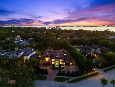 Behind the private gates of this distinguished Belleair estate on Belleview Biltmore Golf Club in Florida - for sale on GolfHomes.com, golf home, golf lot