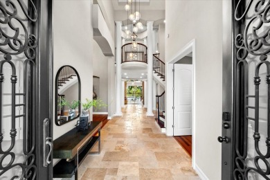 Behind the private gates of this distinguished Belleair estate on Belleview Biltmore Golf Club in Florida - for sale on GolfHomes.com, golf home, golf lot