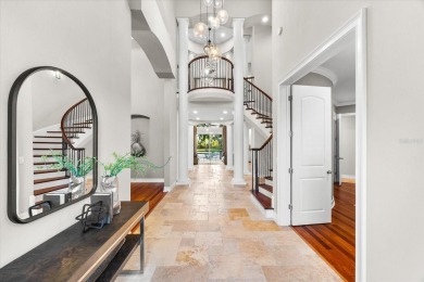 Behind the private gates of this distinguished Belleair estate on Belleview Biltmore Golf Club in Florida - for sale on GolfHomes.com, golf home, golf lot