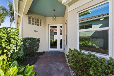 This meticulously maintained residence offers extensive updates on Santa Lucia River Club in Florida - for sale on GolfHomes.com, golf home, golf lot