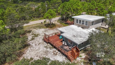 Cute, well-maintained, and updated 2-bedroom home is located on Kiva Dunes Golf Club in Alabama - for sale on GolfHomes.com, golf home, golf lot