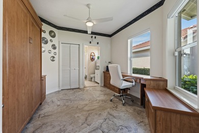 This meticulously maintained residence offers extensive updates on Santa Lucia River Club in Florida - for sale on GolfHomes.com, golf home, golf lot