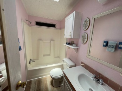 You won't find a better-maintained home than this beautifully on Lakes at Leesburg Golf Course in Florida - for sale on GolfHomes.com, golf home, golf lot