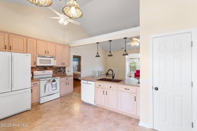 Discover this inviting 3-bedroom, 2-bathroom home nestled in the on Sandpiper Bay Golf and Country Club in North Carolina - for sale on GolfHomes.com, golf home, golf lot