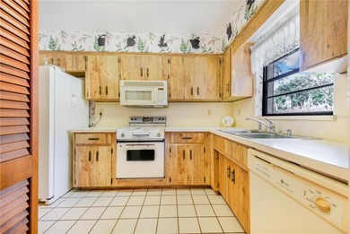 Welcome to this beautifully maintained patio home located in a on Cypresswood Golf and Country Club in Florida - for sale on GolfHomes.com, golf home, golf lot