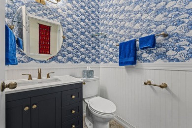 This meticulously maintained residence offers extensive updates on Santa Lucia River Club in Florida - for sale on GolfHomes.com, golf home, golf lot