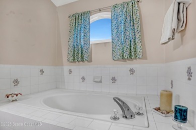 Beautifully upgraded, move-in ready  3-bedroom, 2-bath, 2 car on Suntree Country Club in Florida - for sale on GolfHomes.com, golf home, golf lot